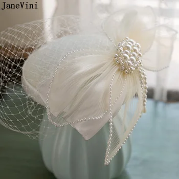 JaneVini Elegant de Nunta Alb Pălărie cu Ace de Păr și Clipuri Pearl Papion Ochiuri Fata Voal de Mireasa Pălării de Petrecere Cocktail Accesorii de Par